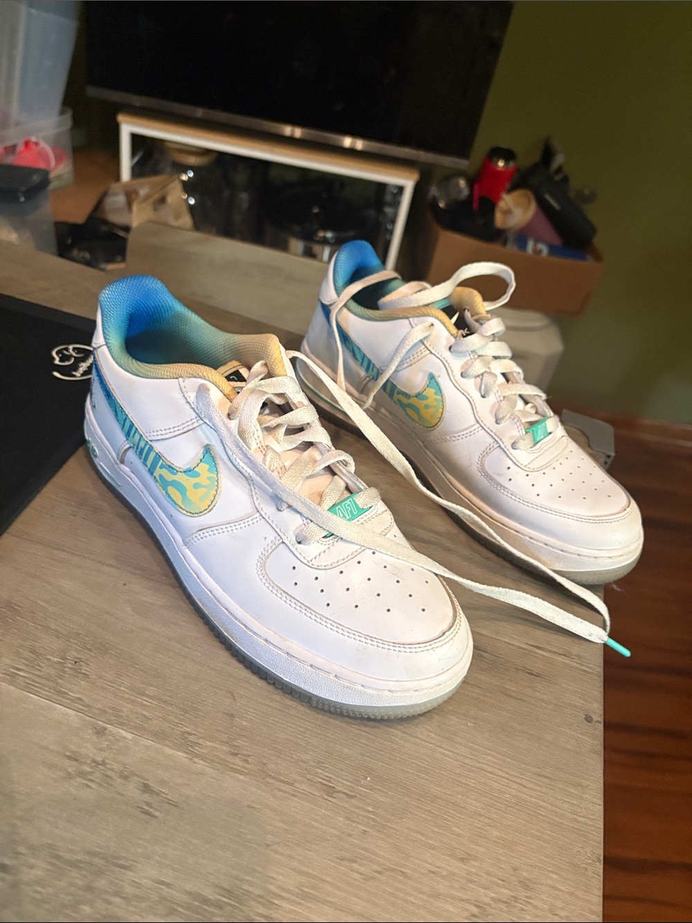 Nike Kids White Sneakers with Teal and Yellow Accents